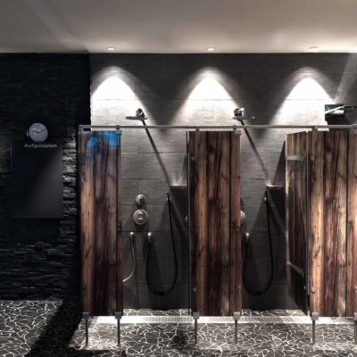 modern shower in a swimming pool with optical wooden plexi glass divider